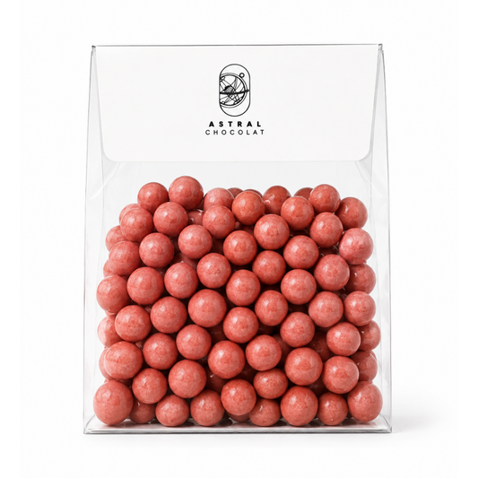 Mini billes soufflées enrobées de Chocolat Blanc Fraise